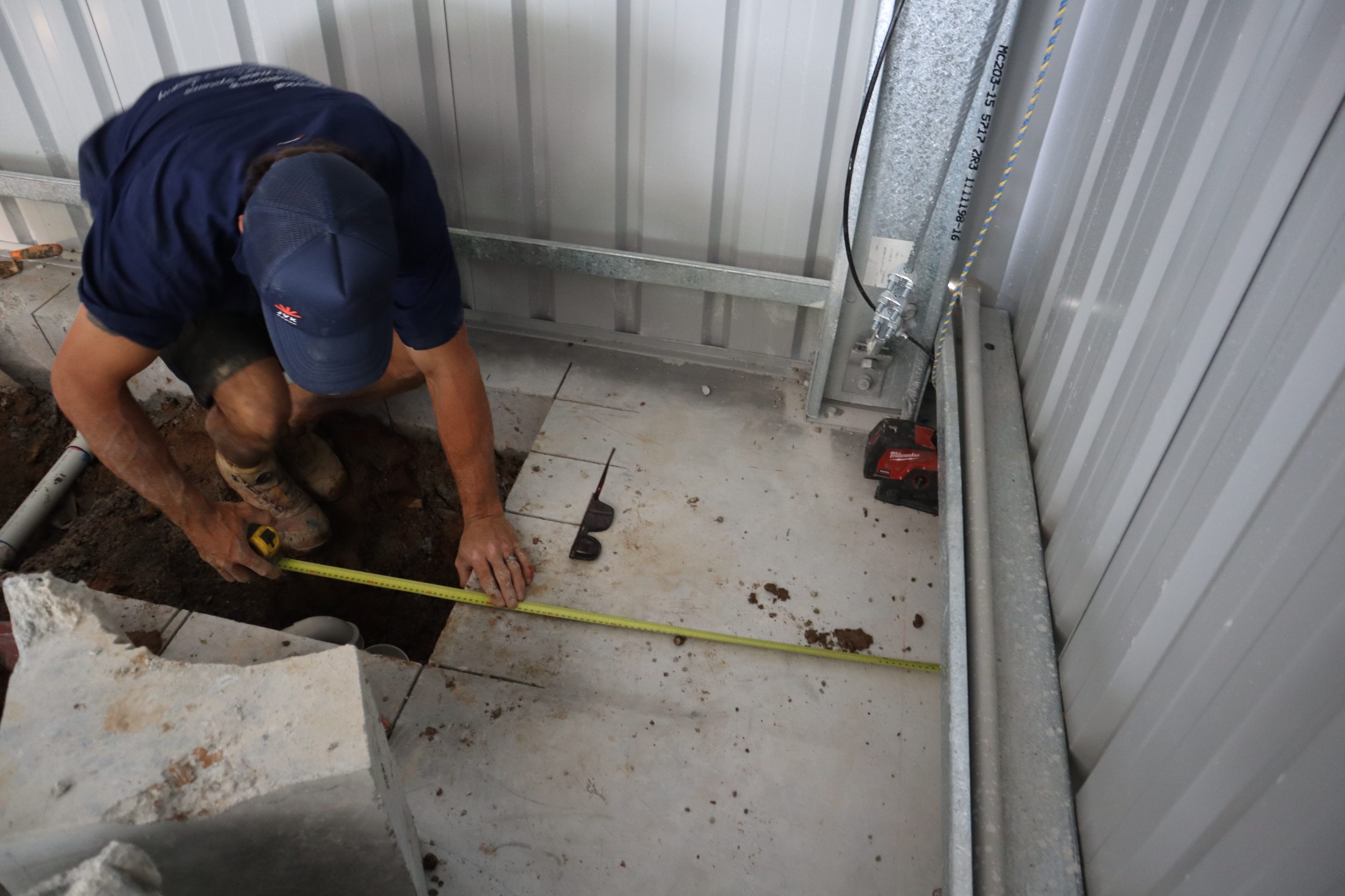 JVK licensed plumber servicing hot water system at Gold Coast home